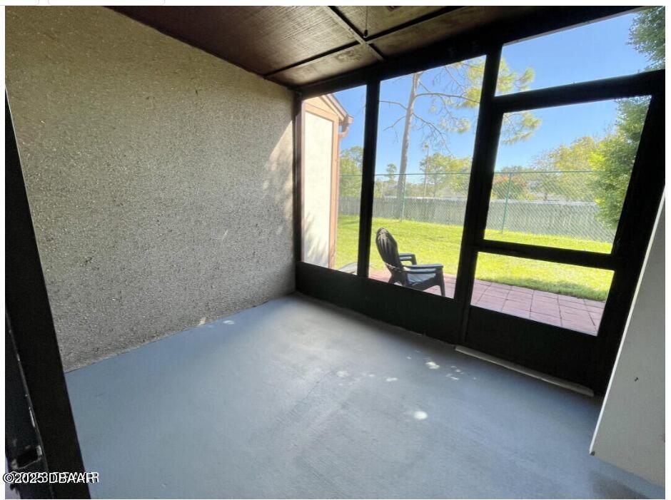 165 White Fawn Drive, Unit MB Daytona Beach, FL 32114 - Photo 34 of 34 a view of an empty room with a window