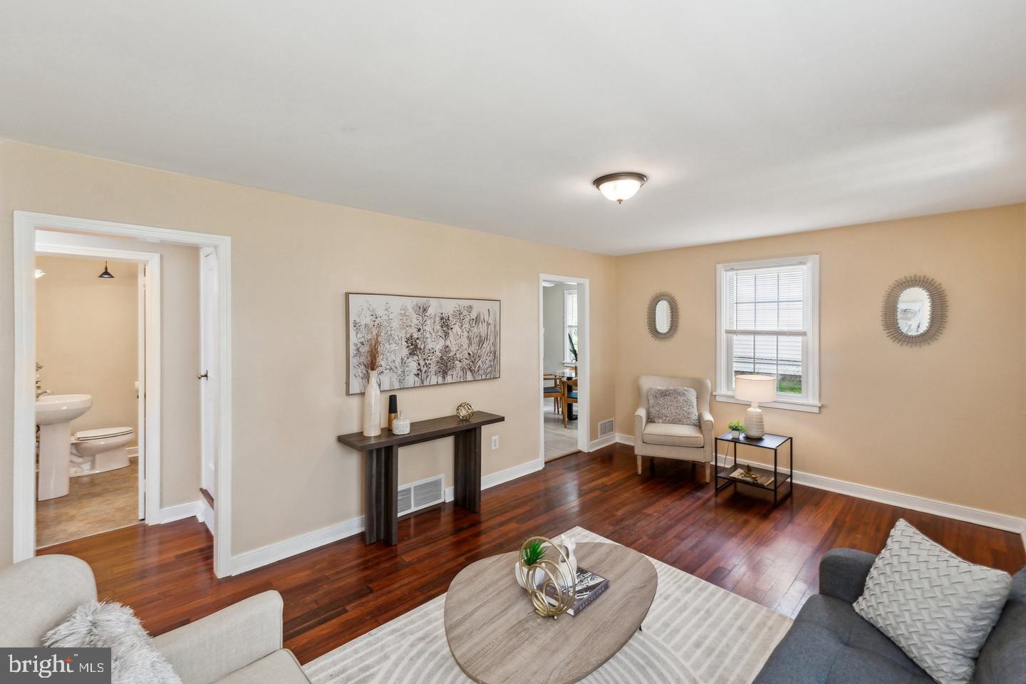 2621 Terrapin Road Silver Spring, MD 20906 - Photo 2 of 11 a living room with furniture rug and window
