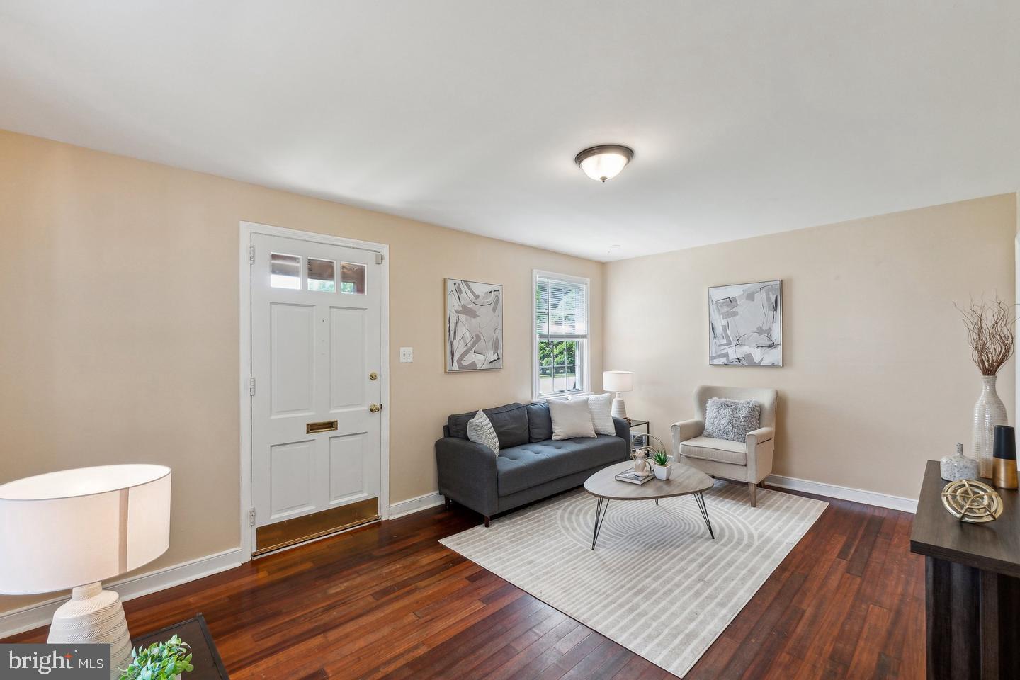 2621 Terrapin Road Silver Spring, MD 20906 - Photo 3 of 11 a living room with furniture and a wooden floor