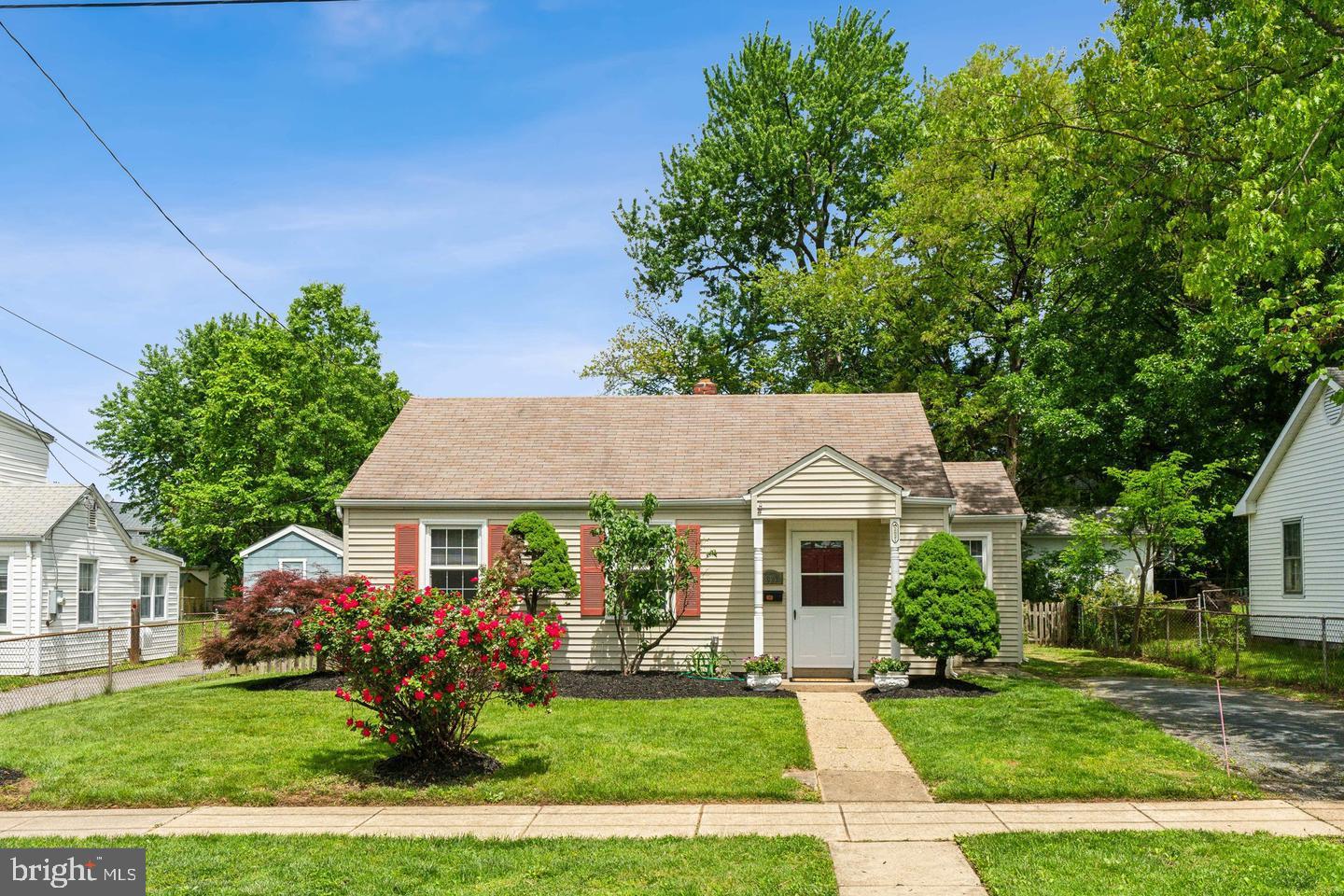 2621 Terrapin Road Silver Spring, MD 20906 - Photo 5 of 11 a front view of a house with a garden