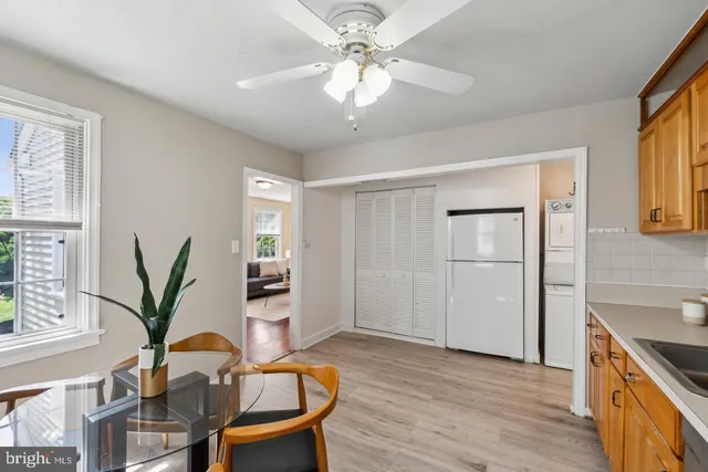 a view of a livingroom with furniture and window