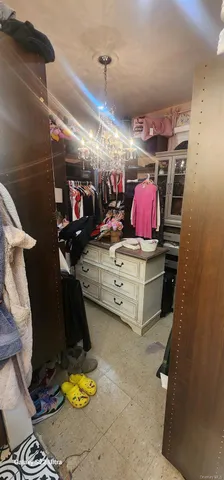 a view of a backyard with table and chairs and couches