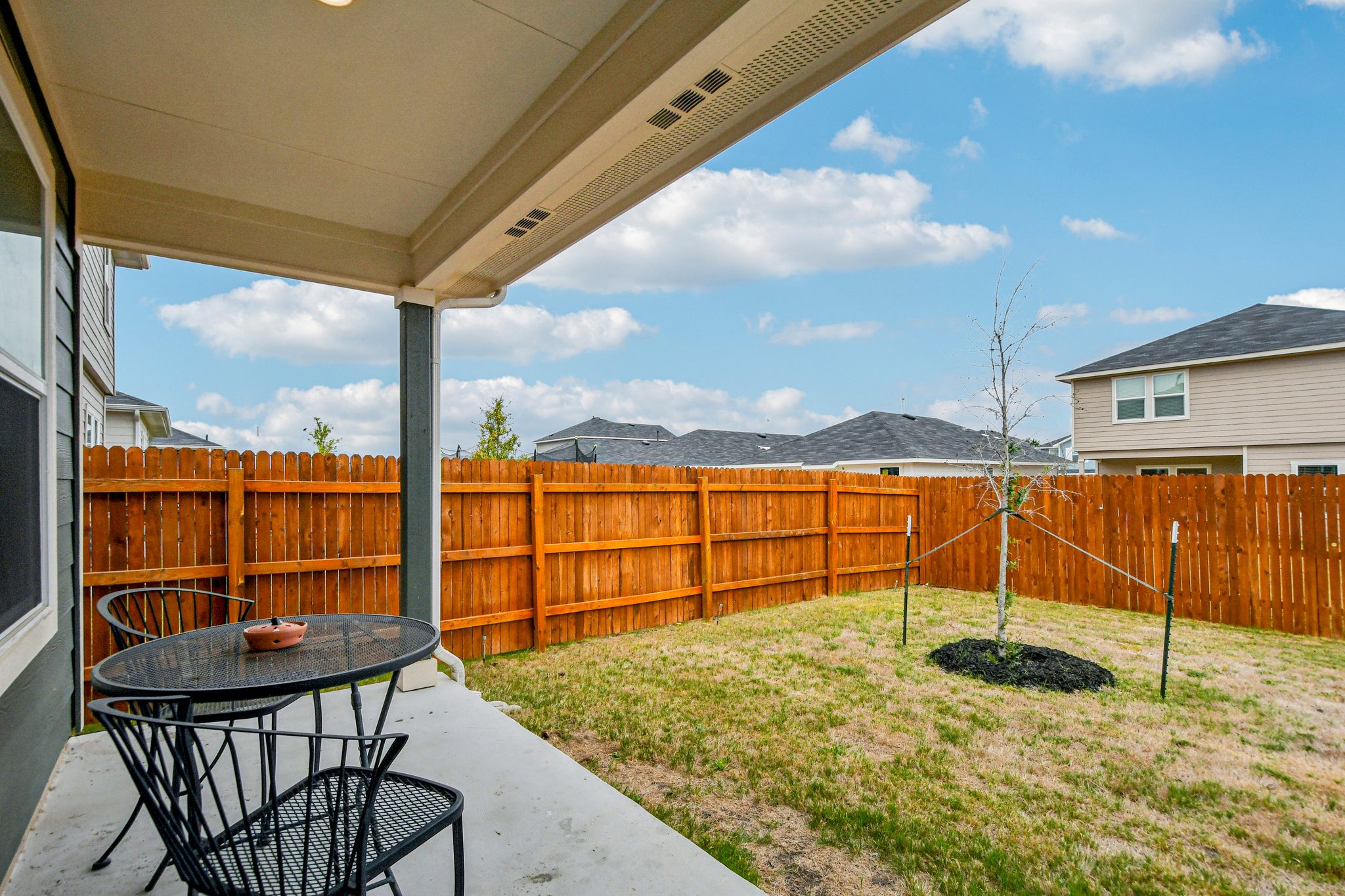 519 Sandringham Loop Kyle, TX 78640 - Photo 29 of 32 Fenced backyard with a patio