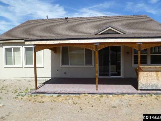 10185 Cavalry Circle Reno, NV 89521 - Photo 10 of 13 a view of a house with a window