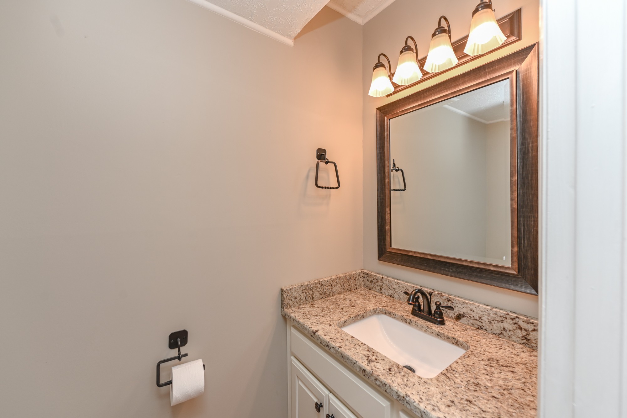288 Donna Drive, Unit E Hendersonville, TN 37075 - Photo 13 of 23 a bathroom with a granite countertop sink vanity and mirror