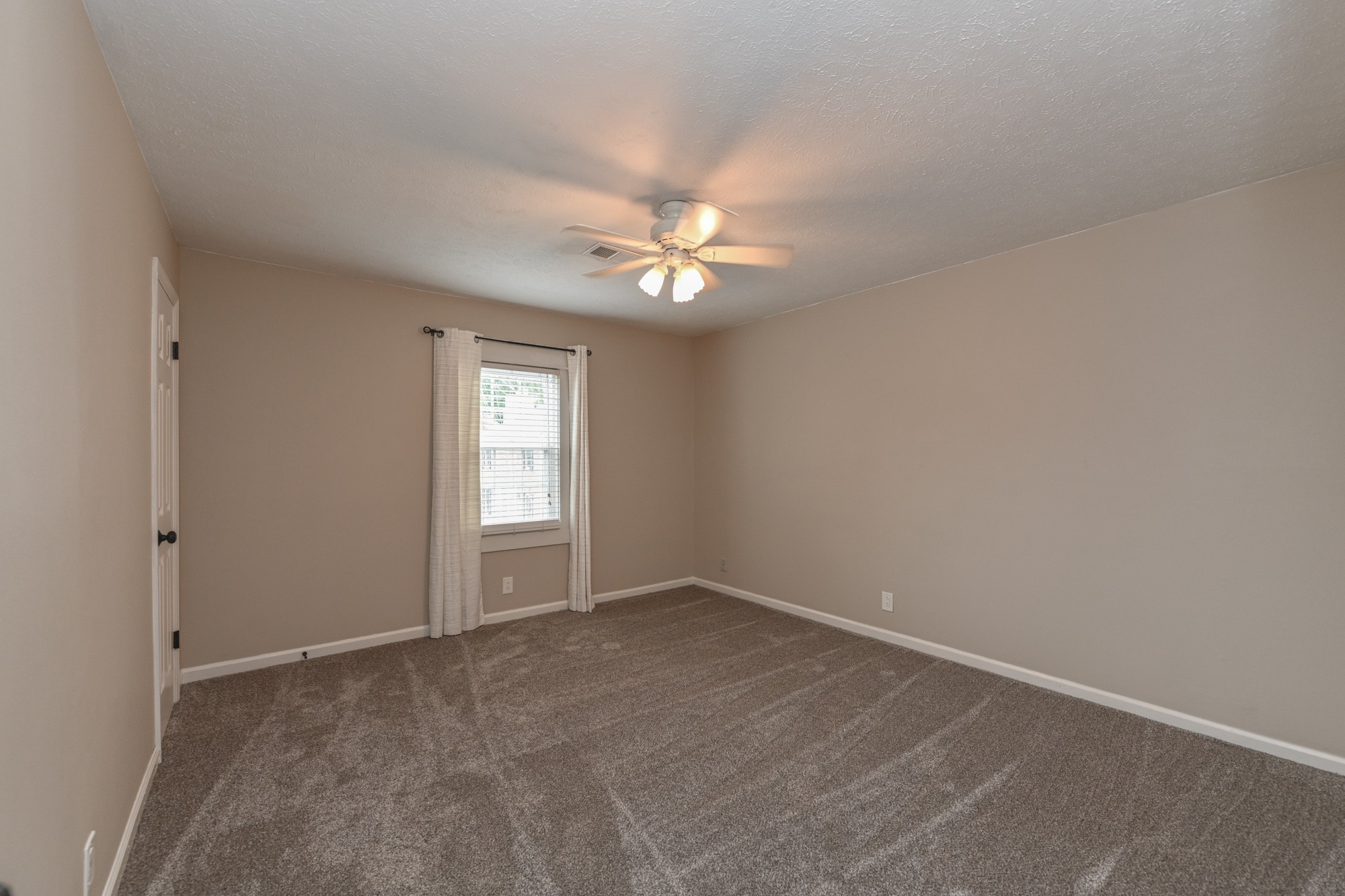 288 Donna Drive, Unit E Hendersonville, TN 37075 - Photo 16 of 23 wooden floor in an empty room with a window