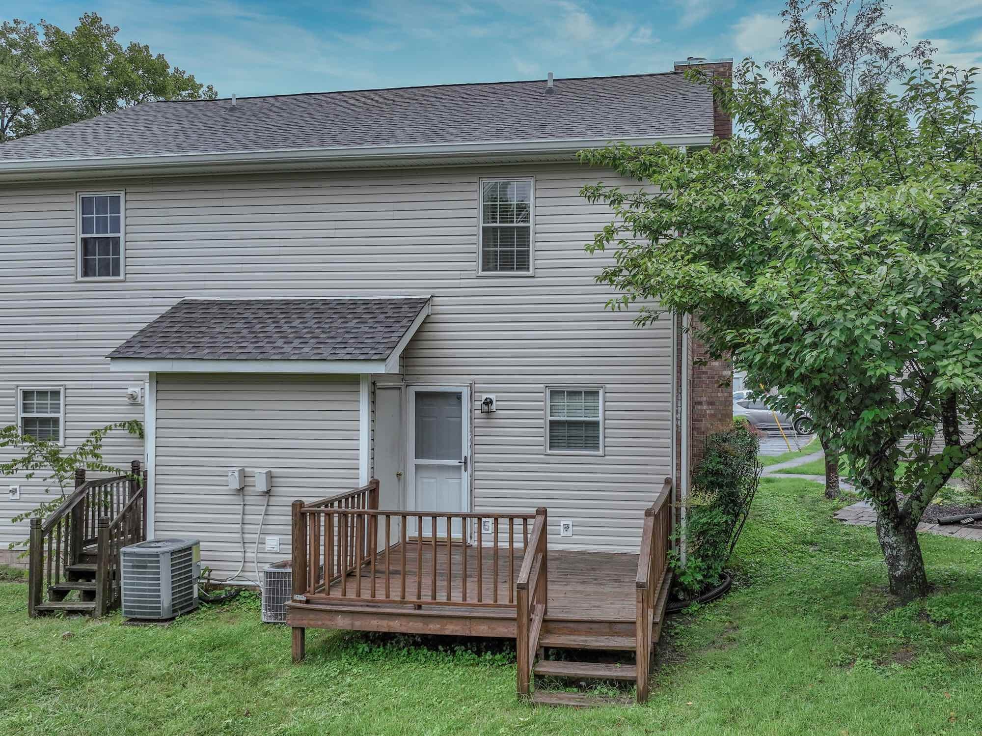 288 Donna Drive, Unit E Hendersonville, TN 37075 - Photo 23 of 23 a view of a house with a backyard
