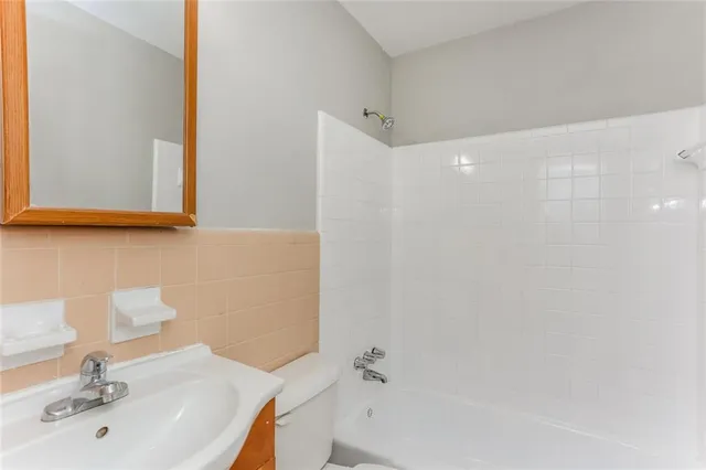 a bathroom with a sink and a bathtub