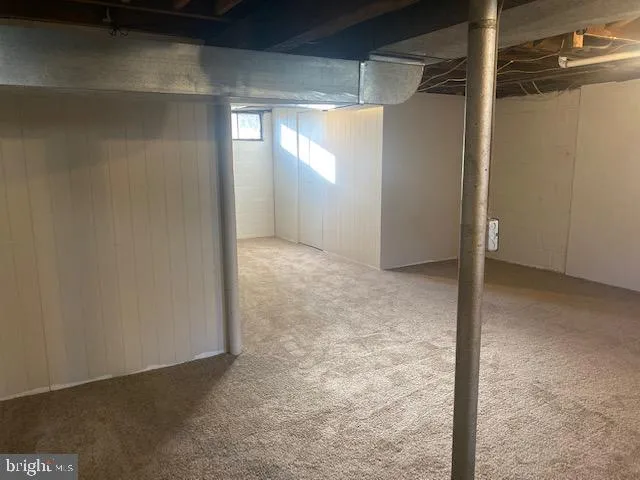 a kitchen with a sink stove and refrigerator