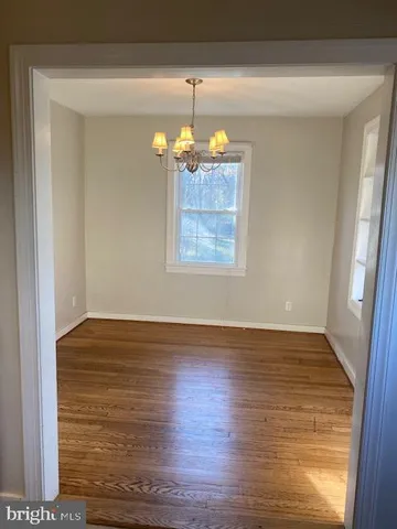 a house with trees in front of it