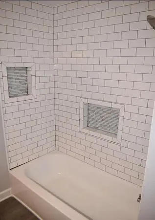 a bathroom with a bathtub