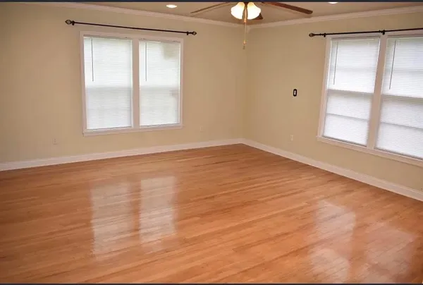 a view of an empty room with a window