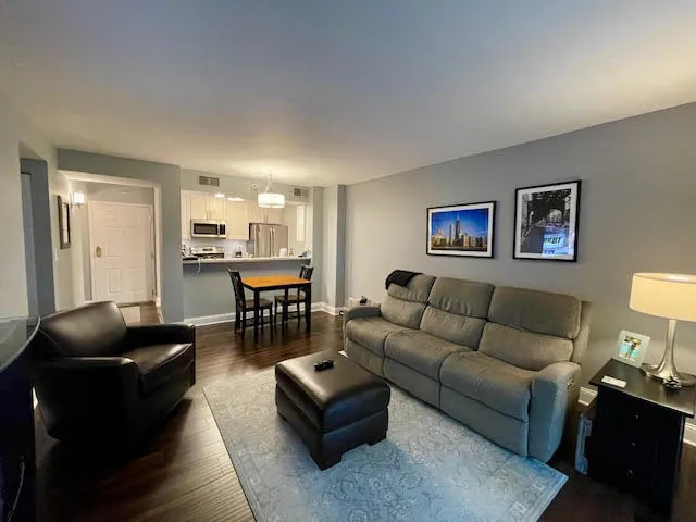 a living room with furniture and a table