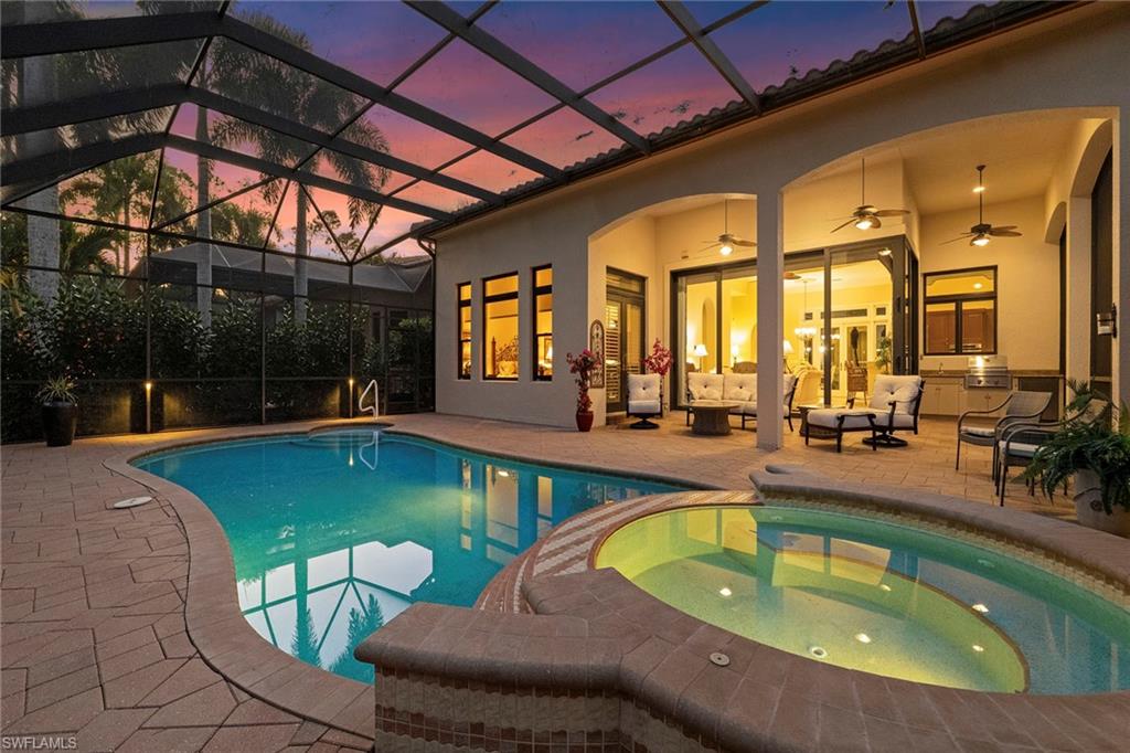 a view of a swimming pool with a patio