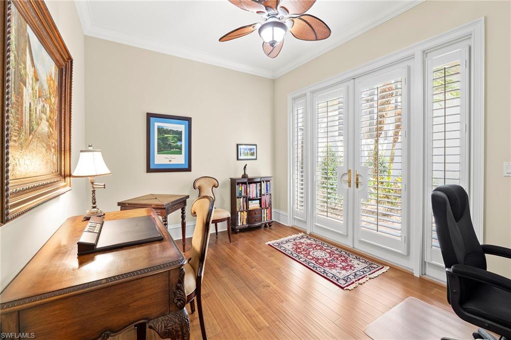 18071 Lagos Way Naples, FL 34110 - Photo 15 of 44 a bedroom with furniture and a window