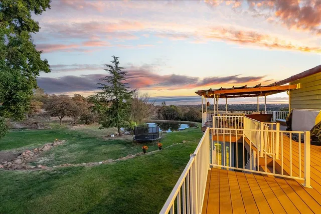 a view of a garden with an outdoor space
