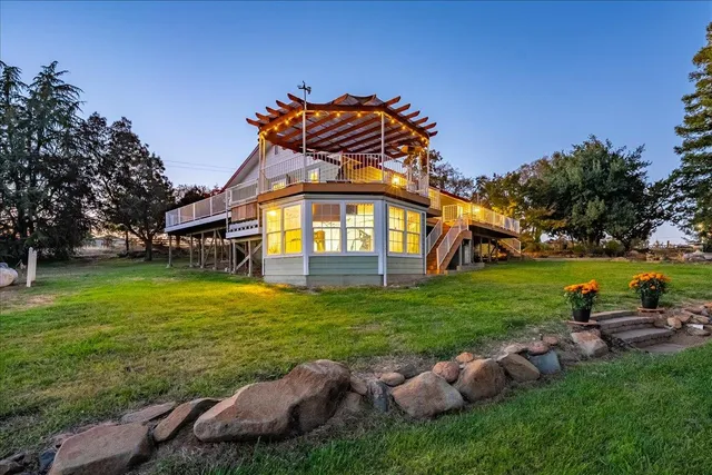 a view of a swimming pool with a lake view