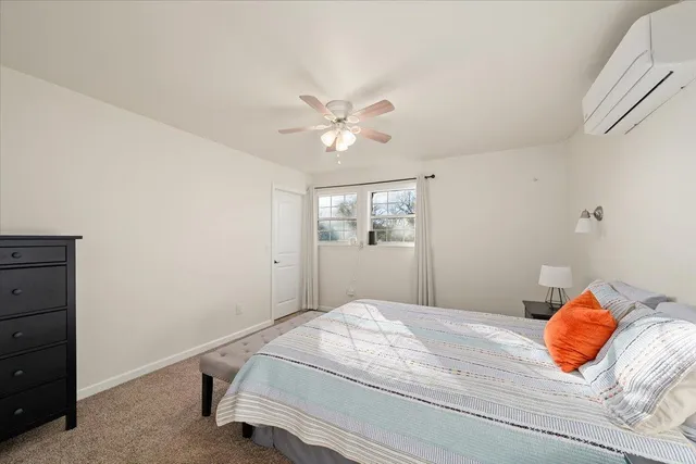 an aerial view of a house with a garden