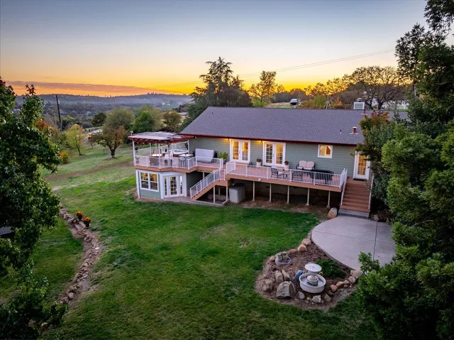 a kitchen with a sink cabinets and a window