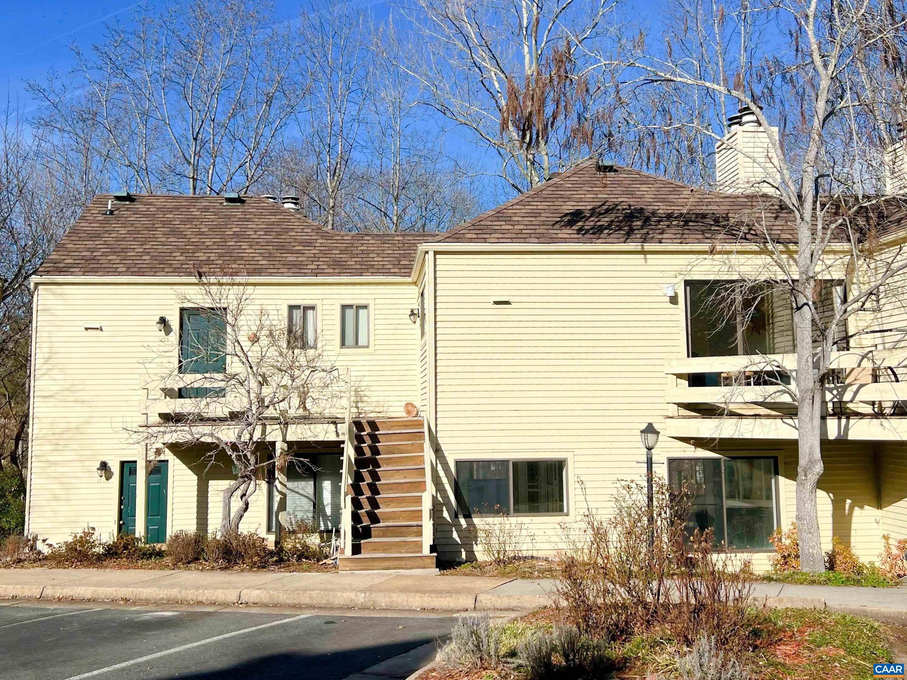 a view of a house with a street