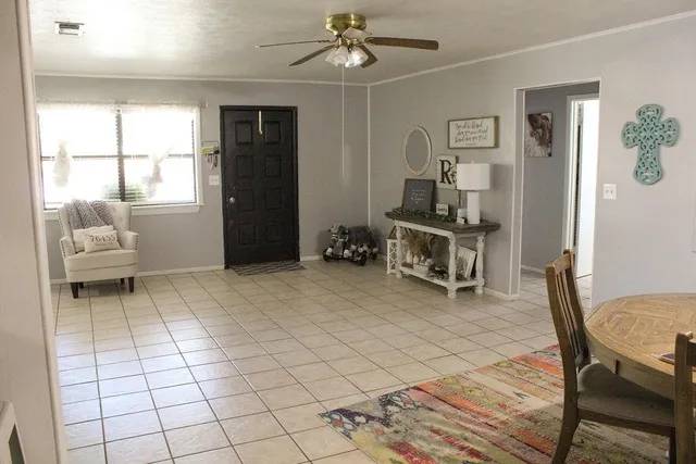 a room with furniture and a window