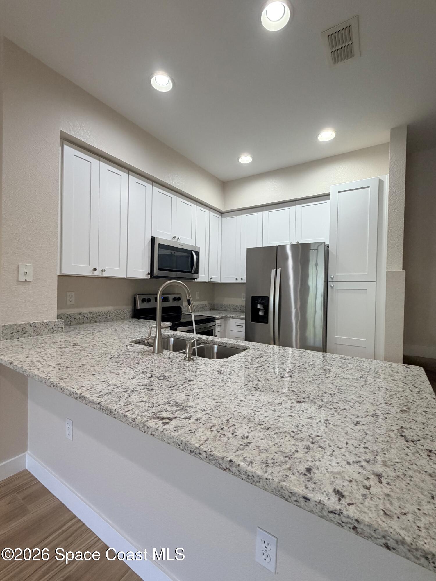 105 Turpial Way, Unit 103 Melbourne, FL 32901 - Photo 4 of 31 IMG_0579