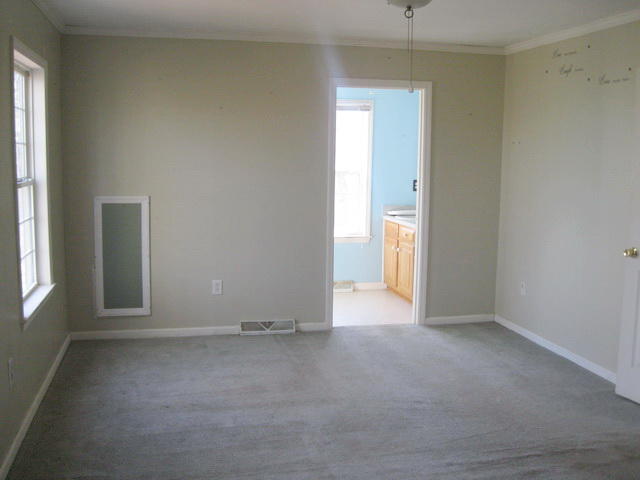 870 Kings Store Road Northeast Check, VA 24072 - Photo 11 of 18 an empty room with windows and closet