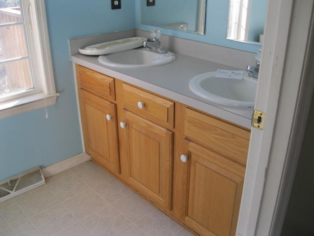 870 Kings Store Road Northeast Check, VA 24072 - Photo 12 of 18 a bathroom with a sink and a mirror