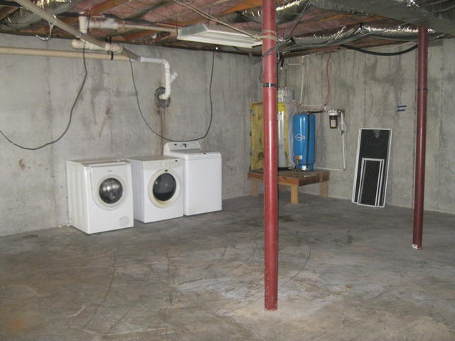 870 Kings Store Road Northeast Check, VA 24072 - Photo 18 of 18 a utility room with a washing machine and a shower