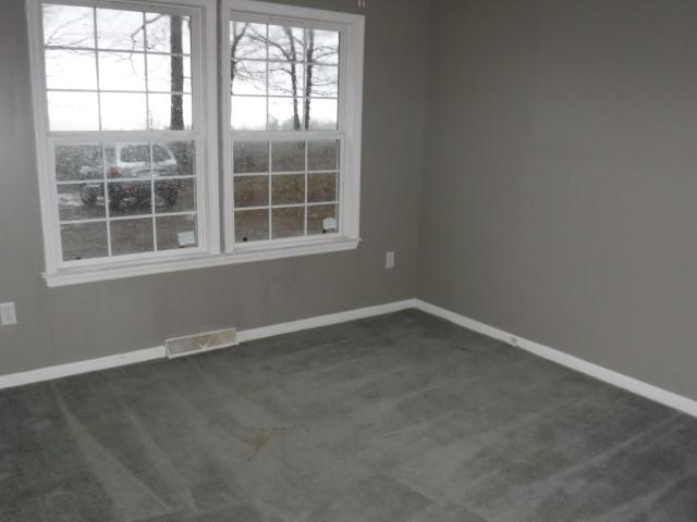 870 Kings Store Road Northeast Check, VA 24072 - Photo 3 of 18 an empty room with a window