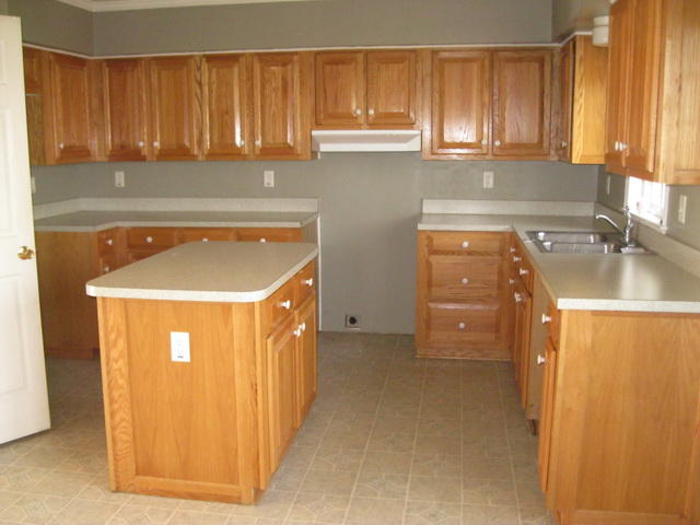 870 Kings Store Road Northeast Check, VA 24072 - Photo 6 of 18 a view of a kitchen with a sink and cabinets