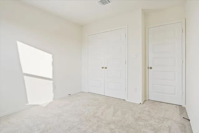 an empty room with closet