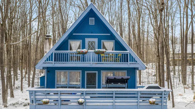 a view of house with patio