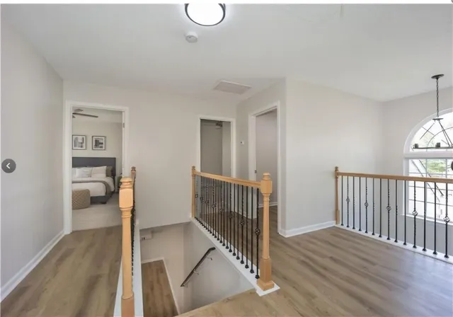 a view of entryway with wooden floor