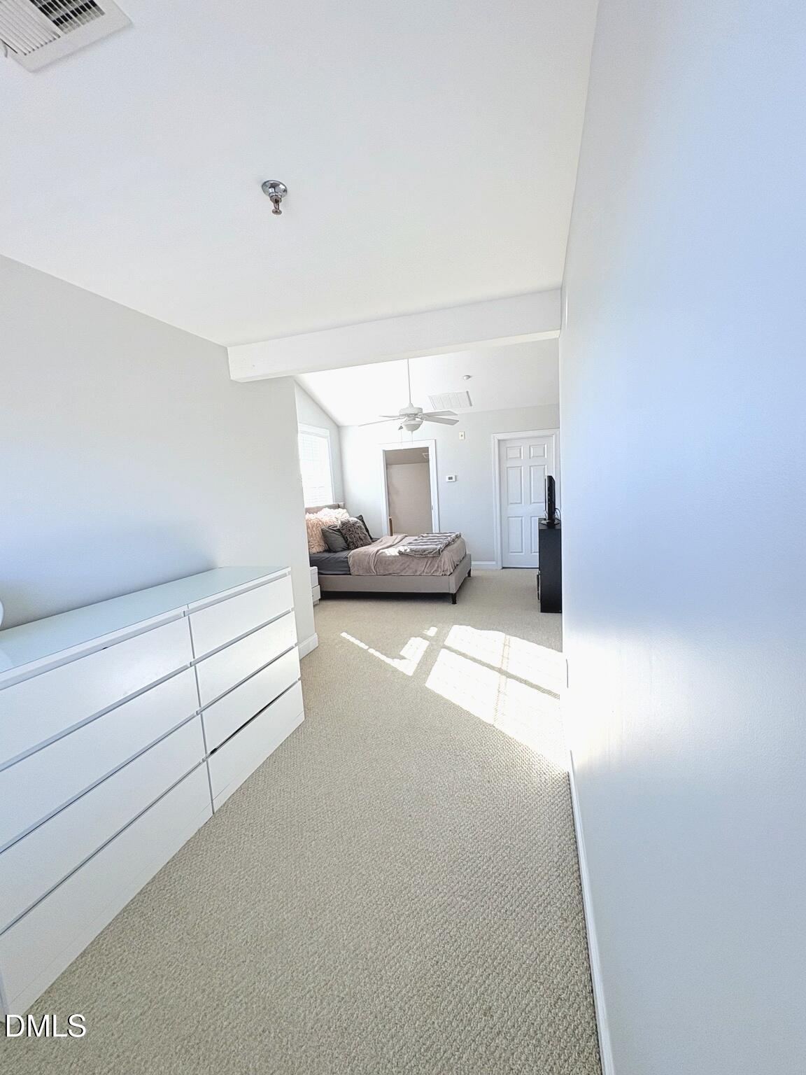 9211 Calabria Drive, Unit 117 Raleigh, NC 27617 - Photo 15 of 19 a view of a hallway with a couch