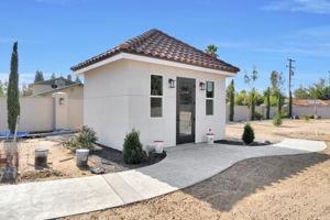 25280 Grove Way Madera, CA 93638 - Photo 28 of 32 a view of a house with potted plants