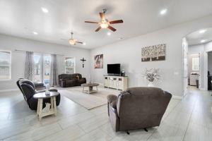 25280 Grove Way Madera, CA 93638 - Photo 5 of 32 a living room with furniture and a flat screen tv