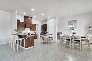 25280 Grove Way Madera, CA 93638 - Photo 9 of 32 a view of a dining area with furniture