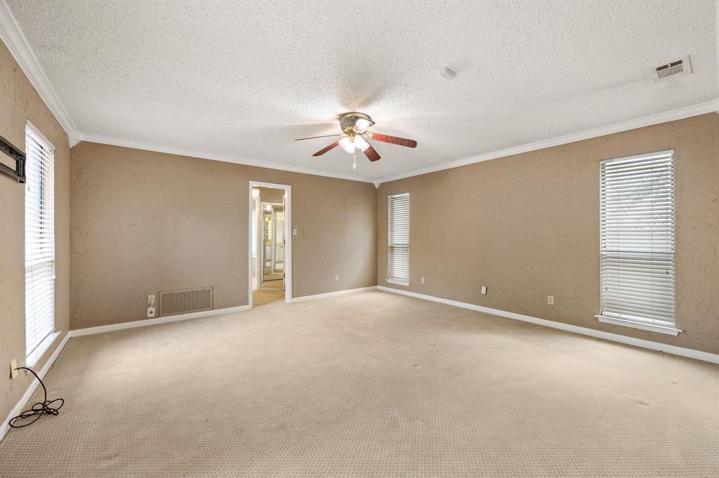 7260 Hudson Cemetery Road Mansfield, TX 76063 - Photo 21 of 40 Spacious room featuring carpet flooring, neutral-toned walls, and multiple windows with blinds