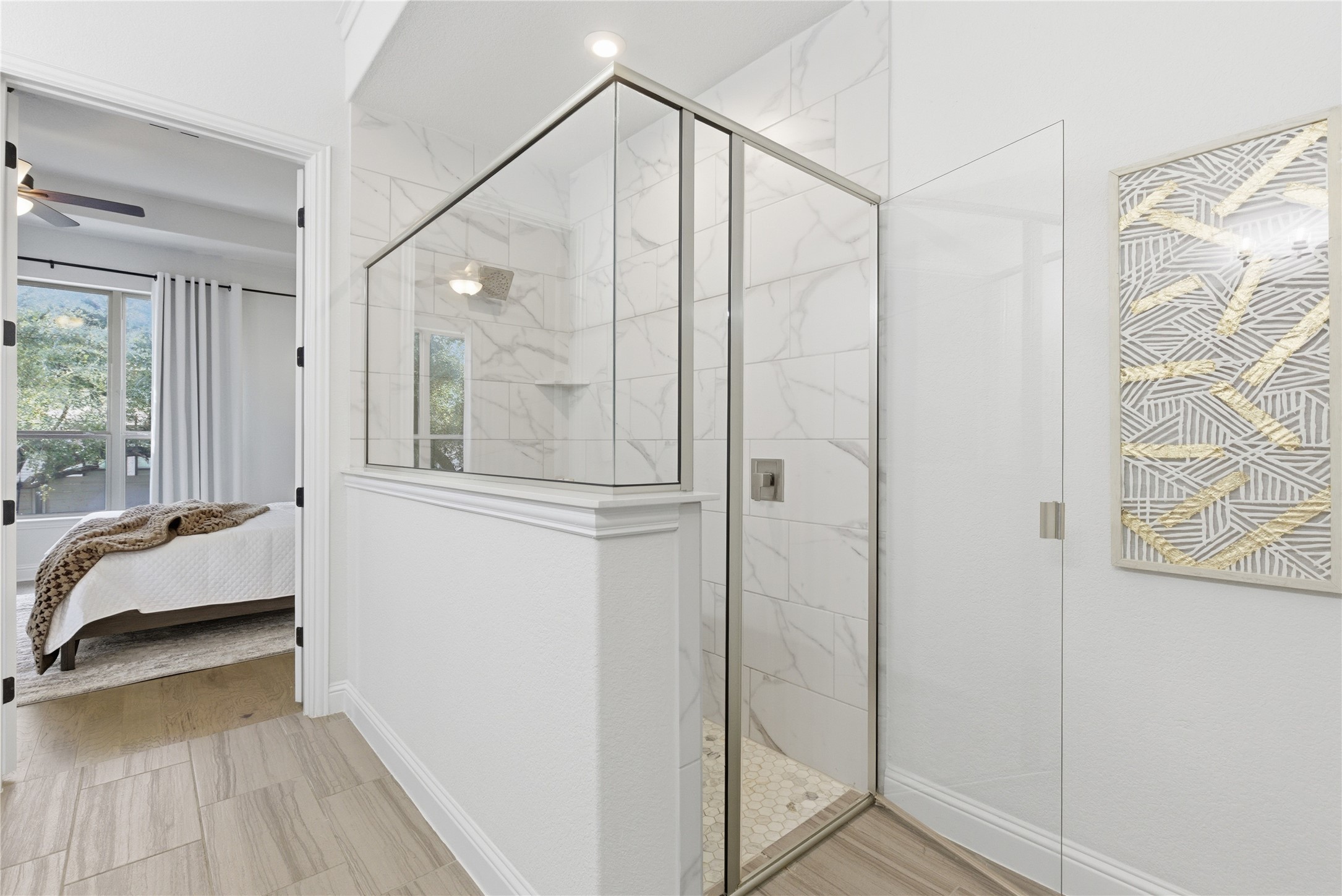 225 Diamondback Drive Georgetown, TX 78628 - Photo 21 of 39 Ensuite bathroom featuring a marble finish shower and light tile flooring.