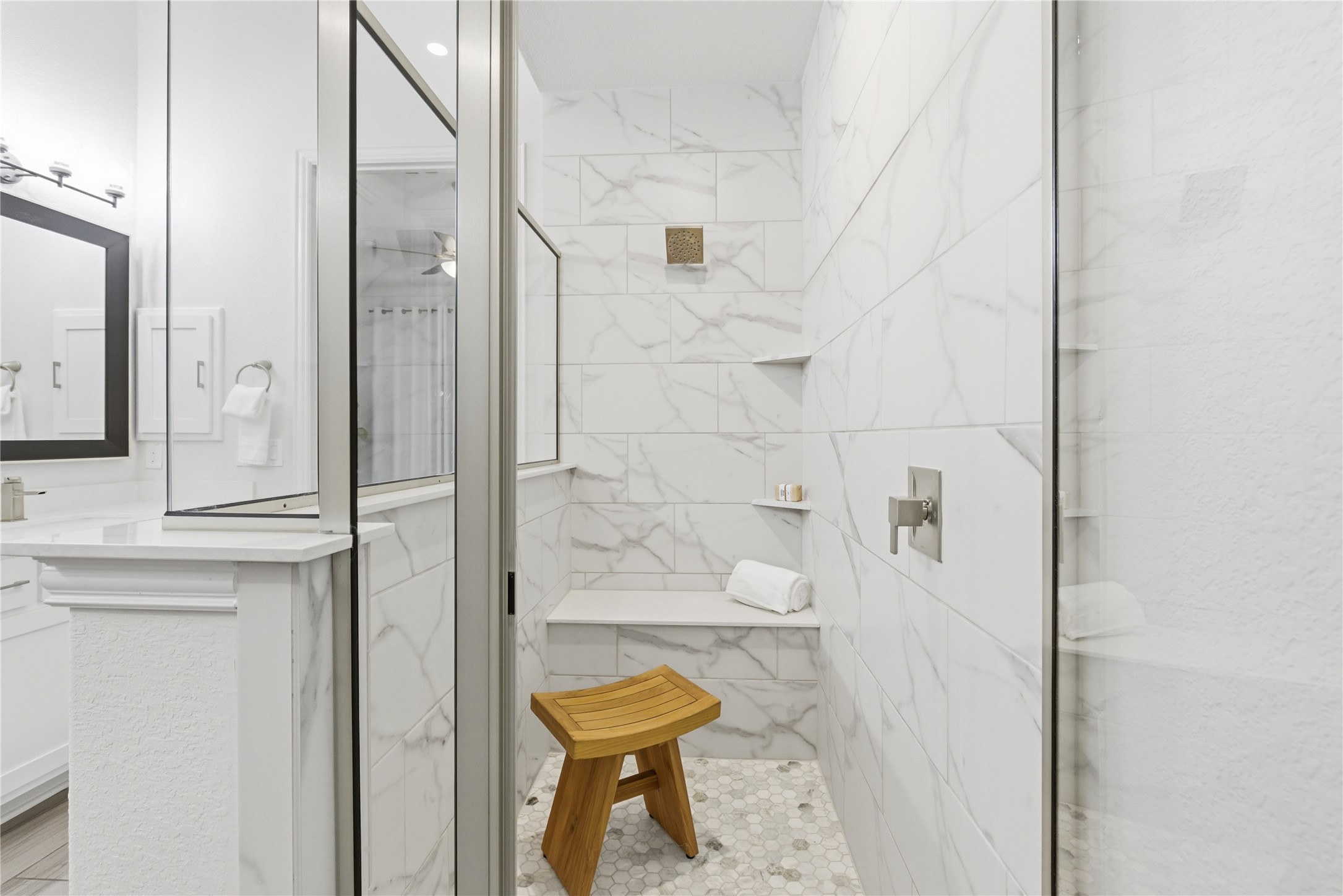 225 Diamondback Drive Georgetown, TX 78628 - Photo 21 of 40 Bathroom featuring a marble finish shower.