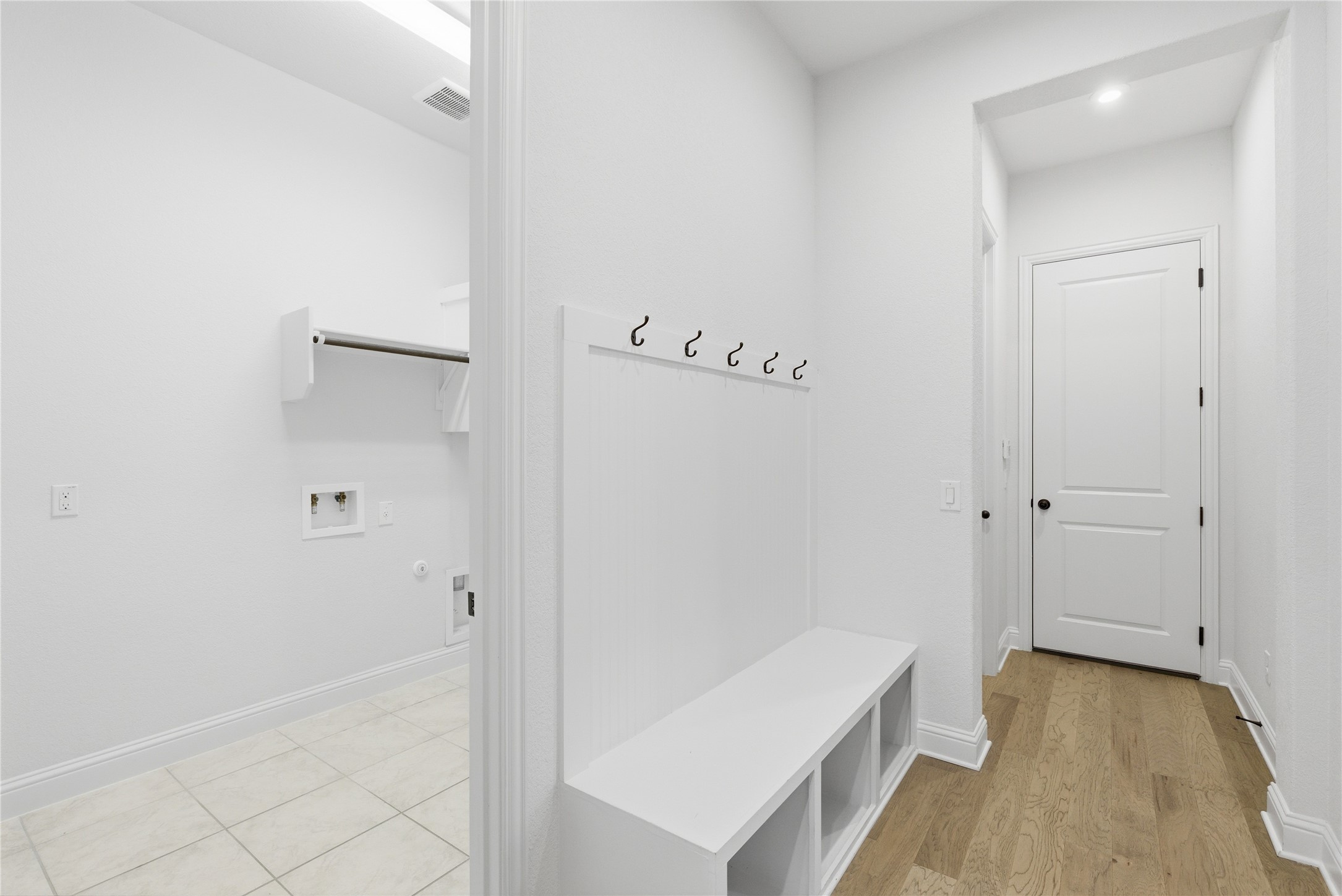 225 Diamondback Drive Georgetown, TX 78628 - Photo 27 of 39 Mudroom with light wood finished floors and recessed lighting