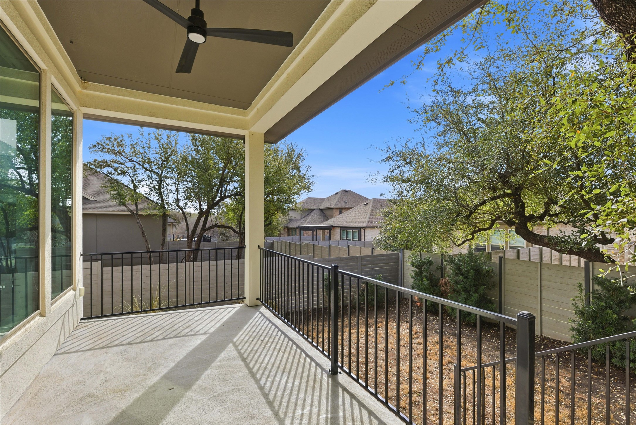 225 Diamondback Drive Georgetown, TX 78628 - Photo 35 of 40 Balcony featuring ceiling fan and a residential view