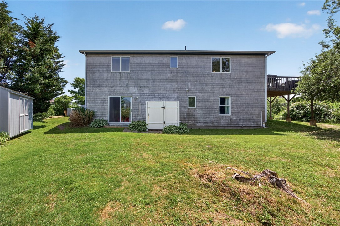 8 SW Road Narragansett, RI 02882 - Photo 30 of 42 Back Yard - Access from Lower Level and Includes an Outdoor Shower