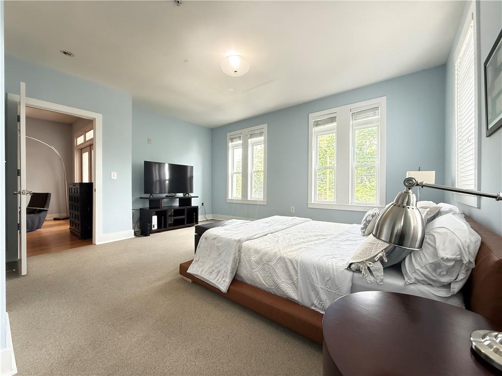 3655 Peachtree Road Northeast, Unit 304 Atlanta, GA 30319 - Photo 20 of 36 a bedroom with bed and window
