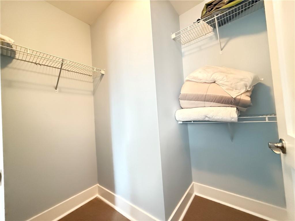 3655 Peachtree Road Northeast, Unit 304 Atlanta, GA 30319 - Photo 28 of 36 a bathroom with a window and a shower