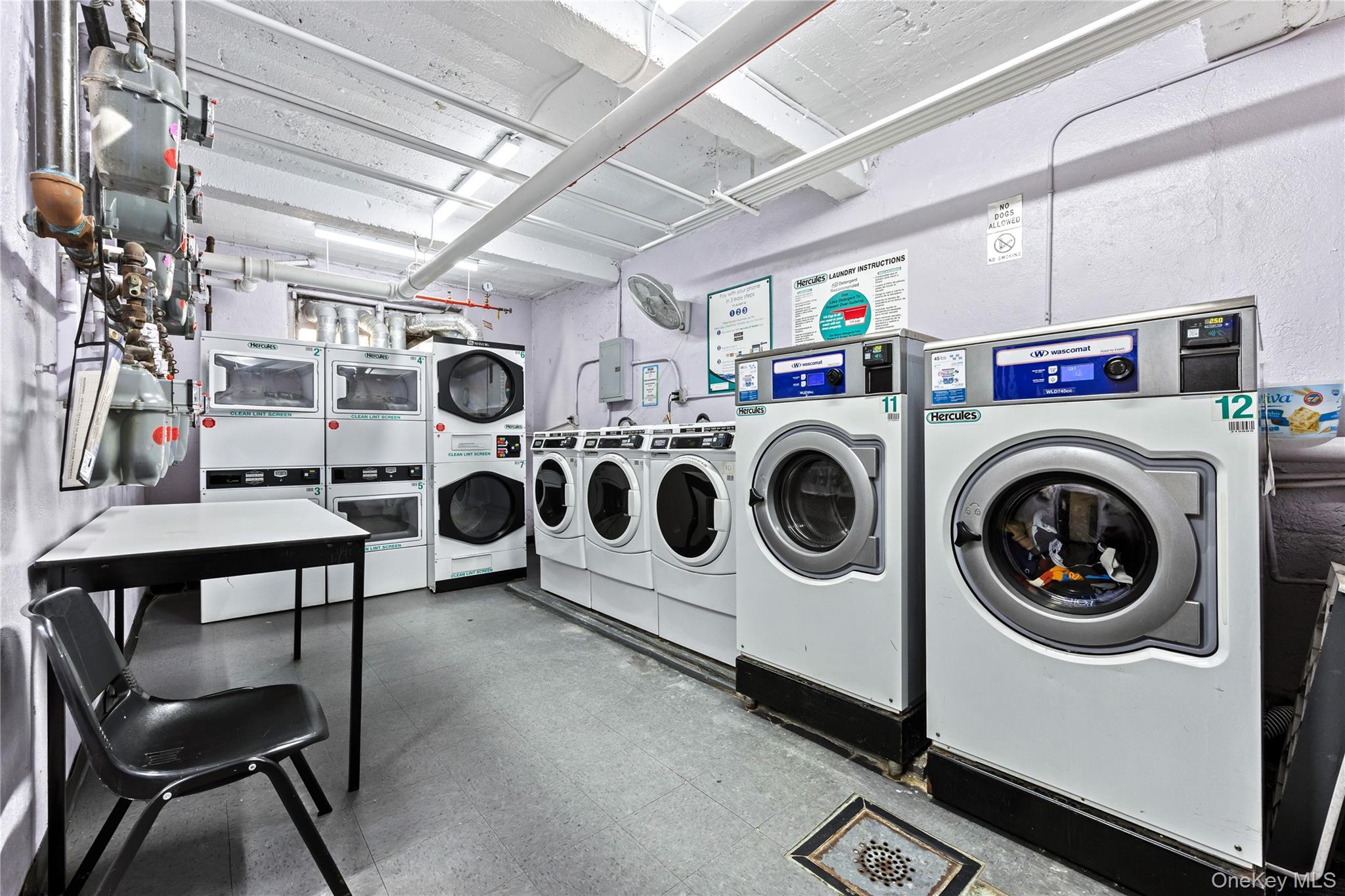 325 East 201st Street, Unit 5F Bronx, NY 10458 - Photo 14 of 19 a utility room with dryer and washer