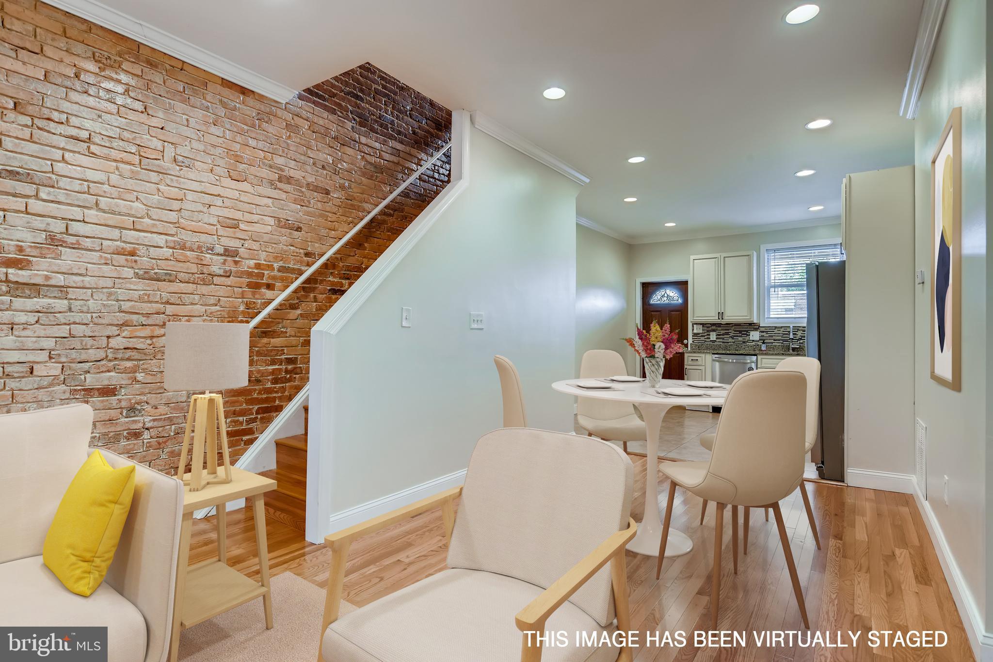 4326 Falls Road Baltimore, MD 21211 - Photo 5 of 31 Virtually staged dining area into kitchen