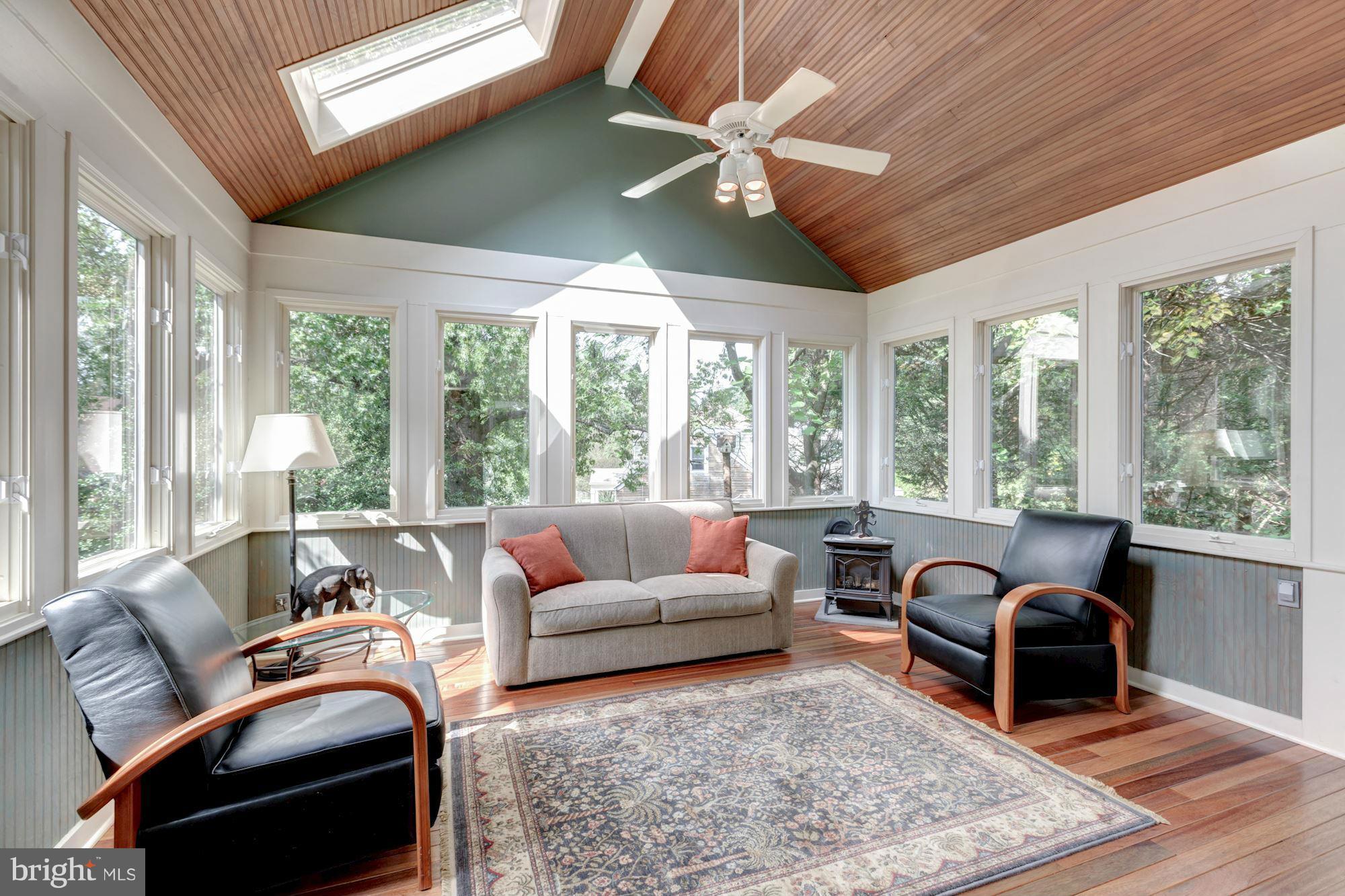 1654 Birch Road McLean, VA 22101 - Photo 12 of 30 Beautiful Sunroom with Skylight and Gas Stove