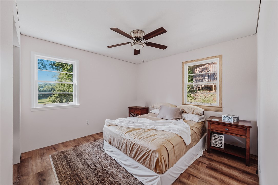 209 Cleveland Pike Road Westminster, SC 29693 - Photo 17 of 30 Naturally illuminated bedroom with durable hardwood-style flooring.